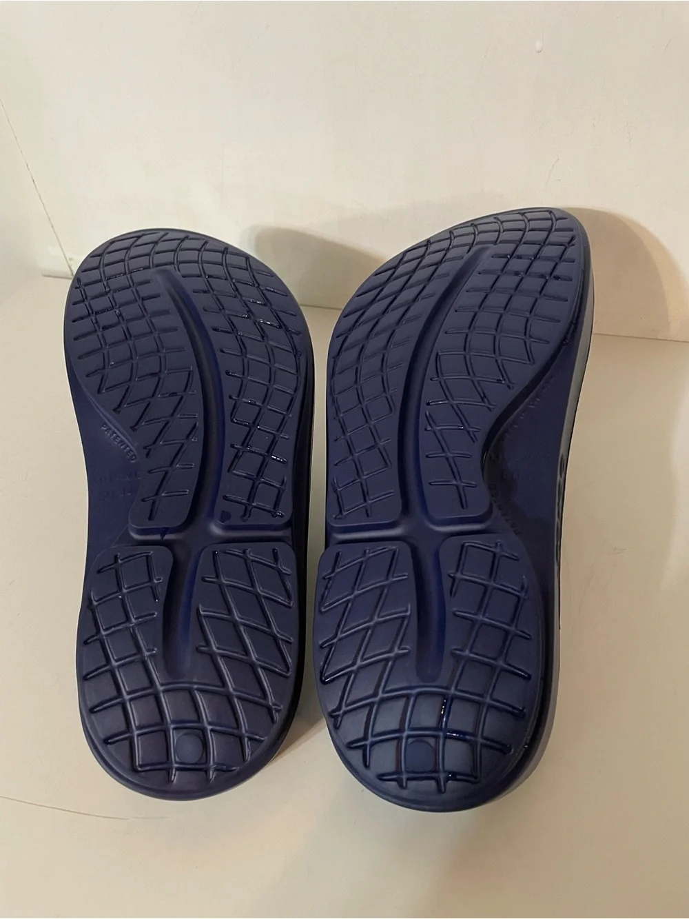 Oofos Slides in Navy Blue